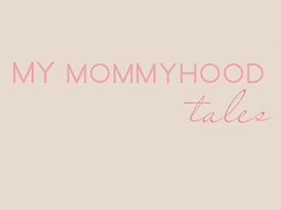 My Mommyhood is written in bold pink letters and tales is written in cursive letter.